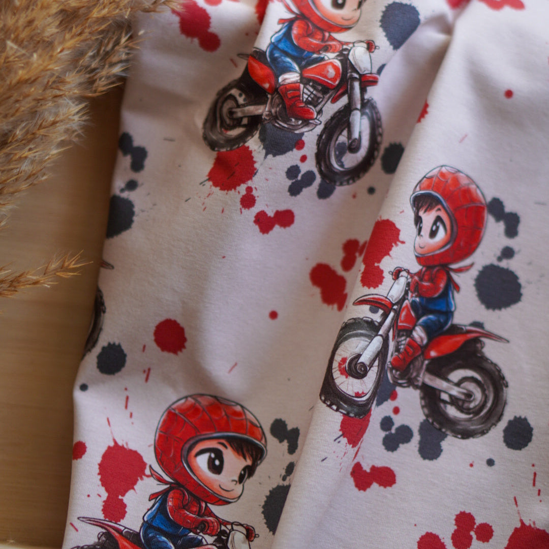 Kinderstoff Junge auf Motorrad rot und blau